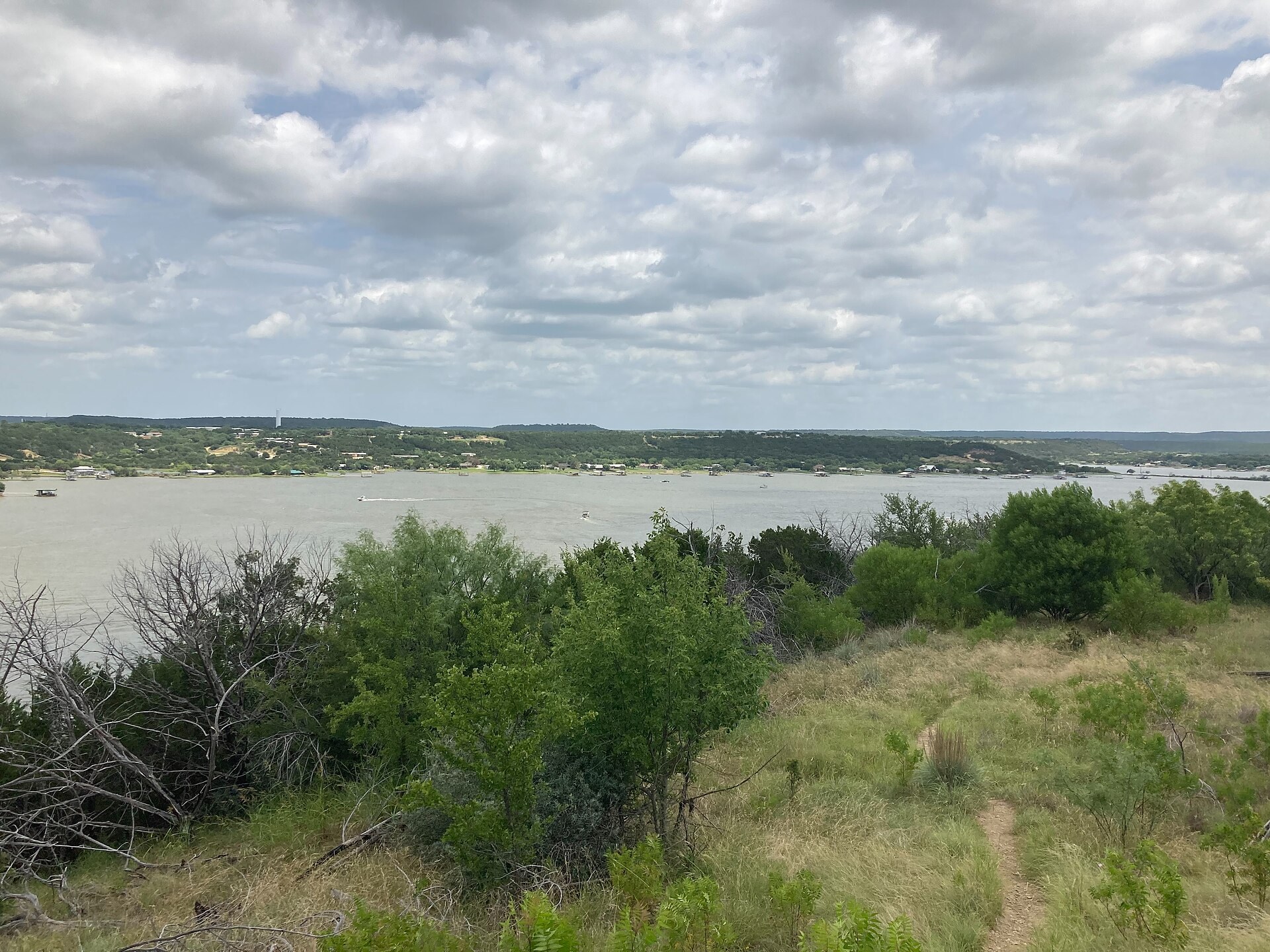 Best Lakes in Texas - Possum Kingdom Lake Possum Kingdom Lake clear water and rock formations, one of the best lakes in Texas near Dallas