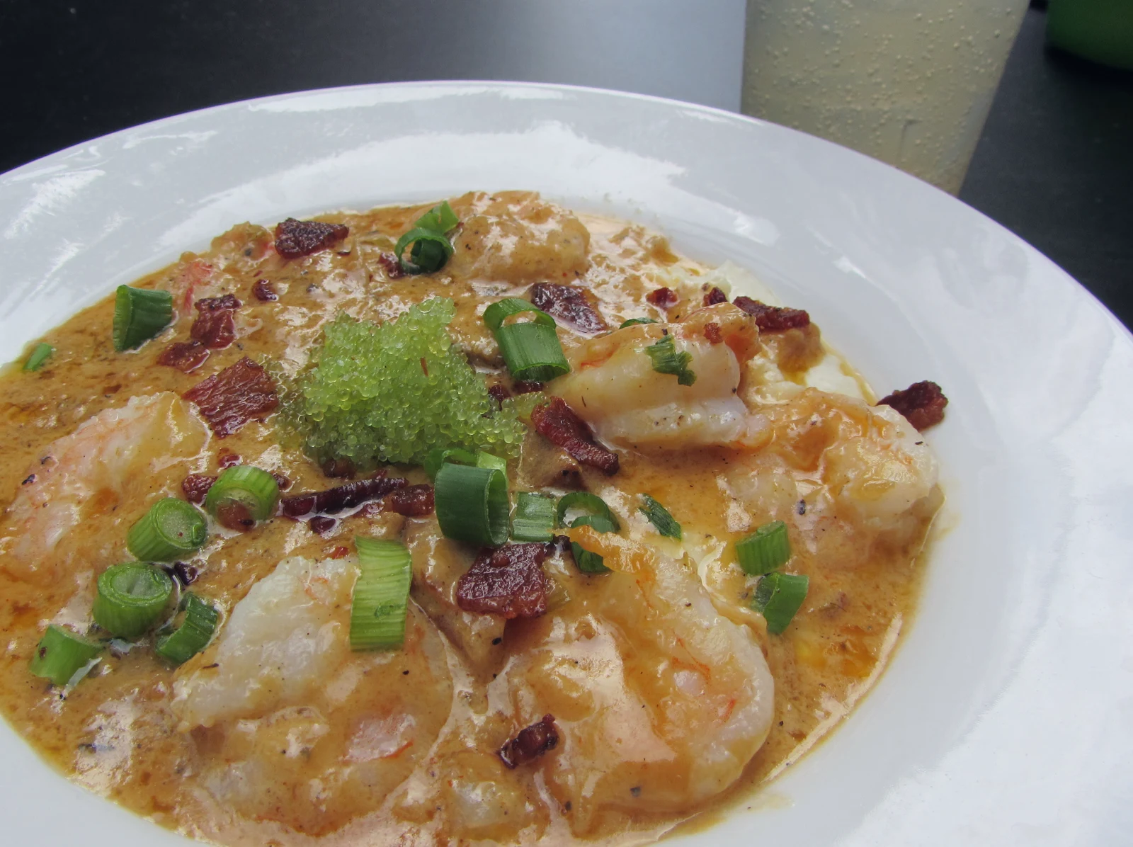 Gulf-style shrimp and grits Shrimp and grits, a Gulf-style staple at Dallas seafood restaurants