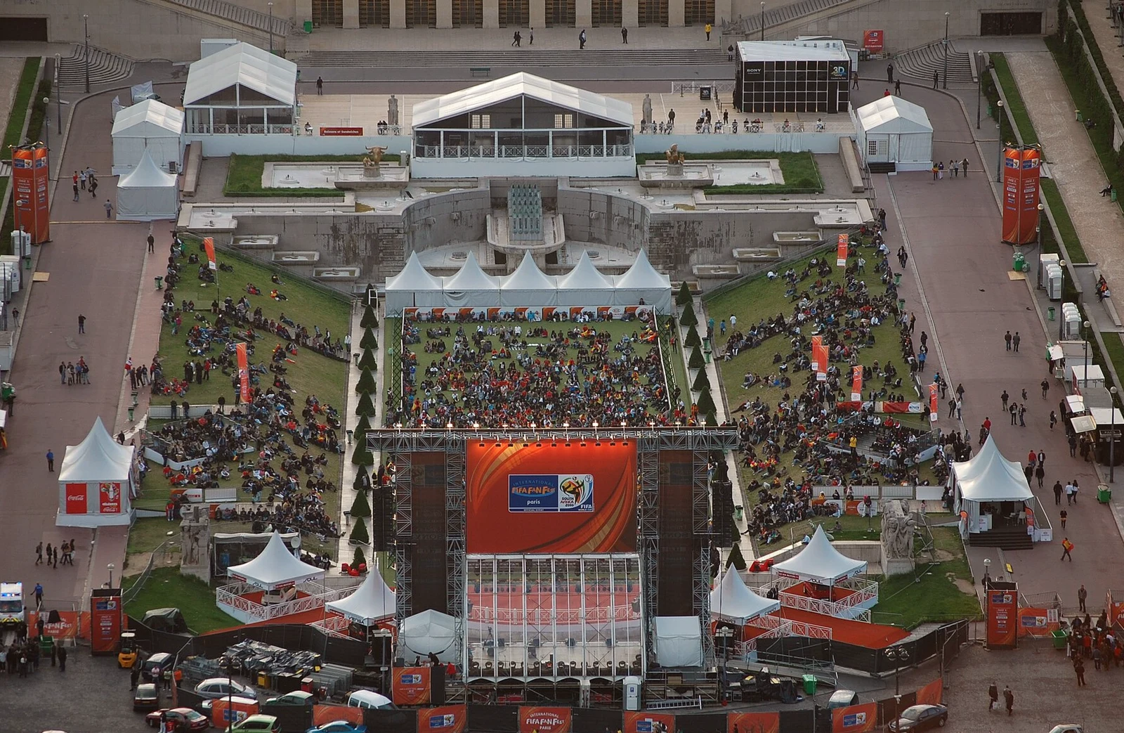 Crowd watching a World Cup match on a big screen at an outdoor fan festival