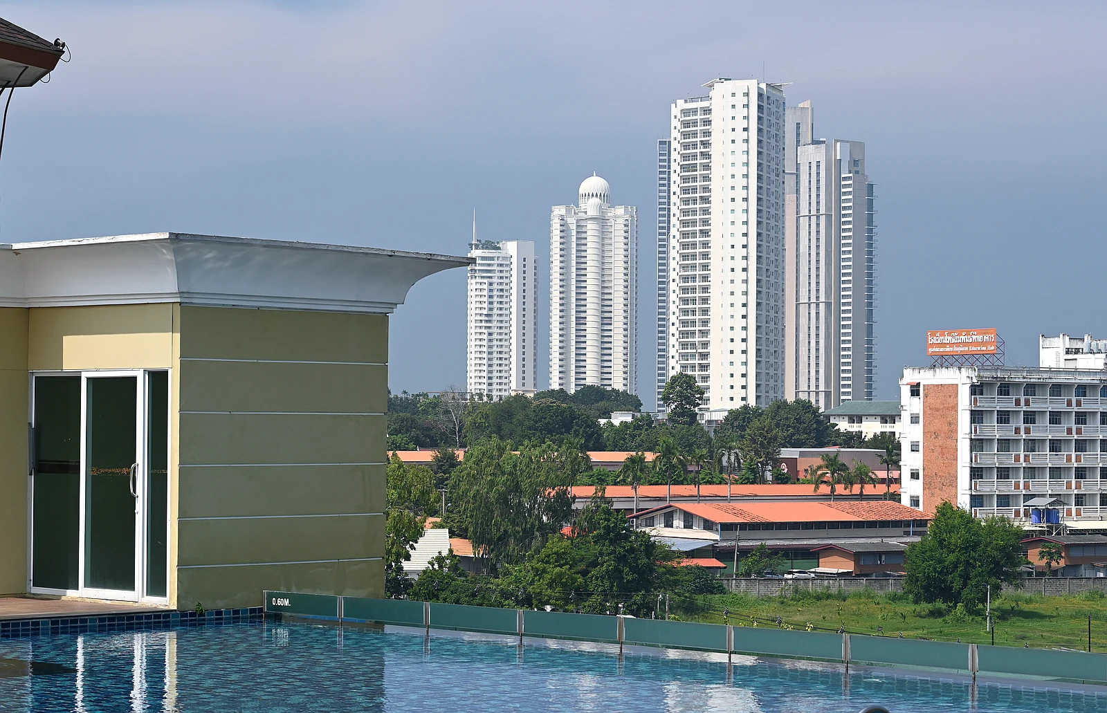 A rooftop infinity pool with skyline views