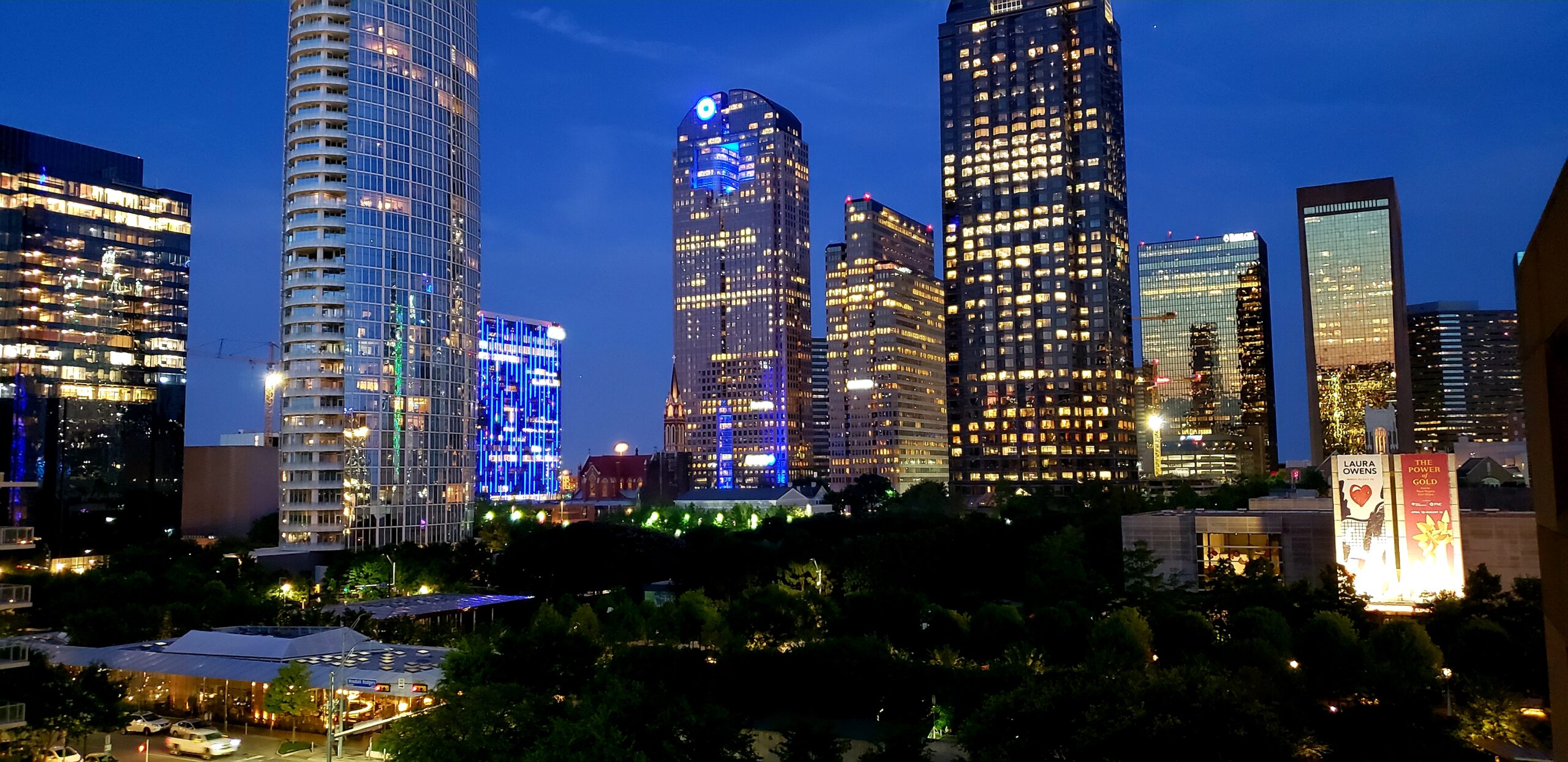 Downtown Dallas business district - where the jobs are Downtown Dallas office towers at dusk seen from Klyde Warren Park